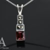 Sparkling Garnet Necklace Pendant in Silver and Marcasite